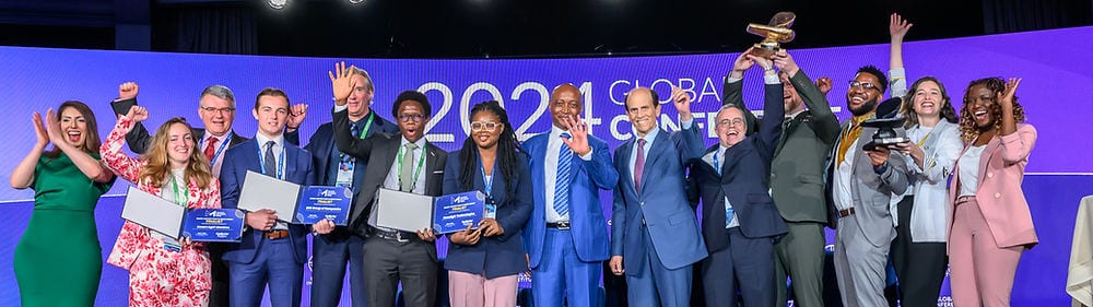 Aftrak team on stage receiving the Milken-Motsepe Prize in Green Energy
